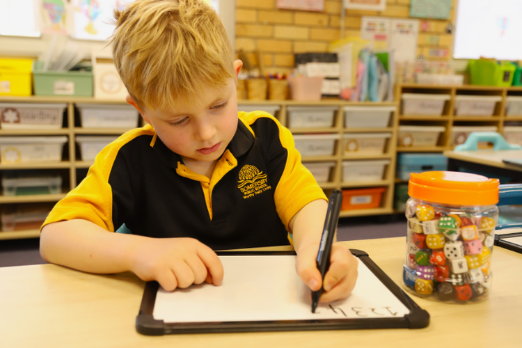 a male student doing maths work