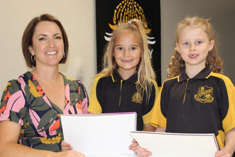 Kirsten Blake with two female students